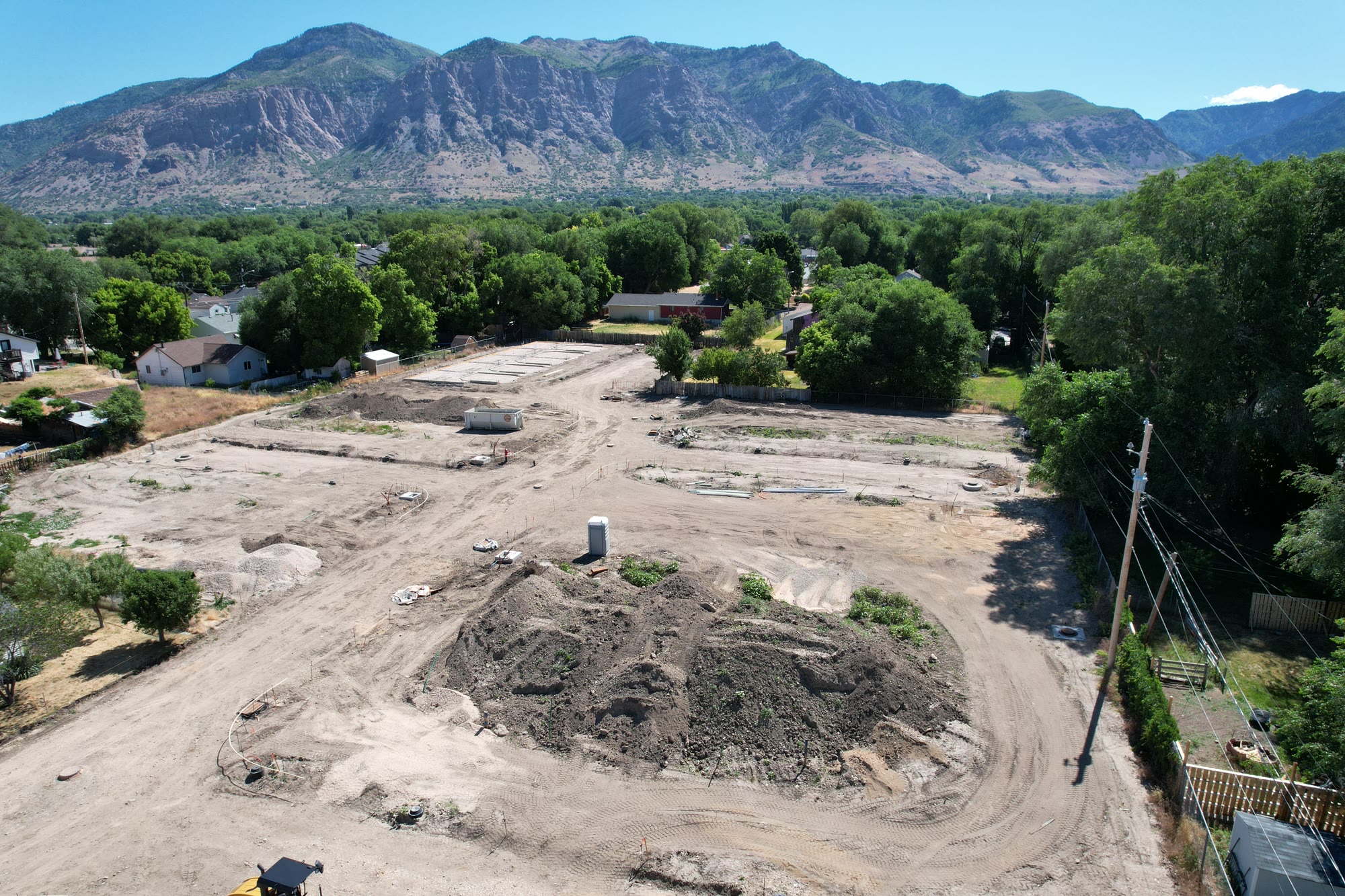 The Chester Street site from above with grading complete and the Wasatch behind